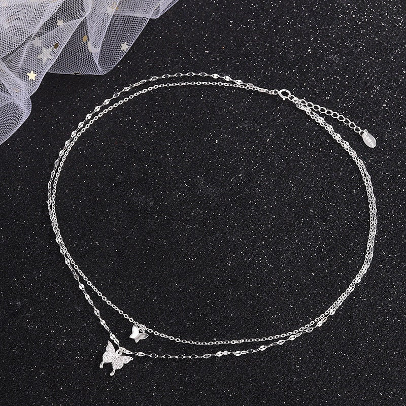Collier double papillon en argent