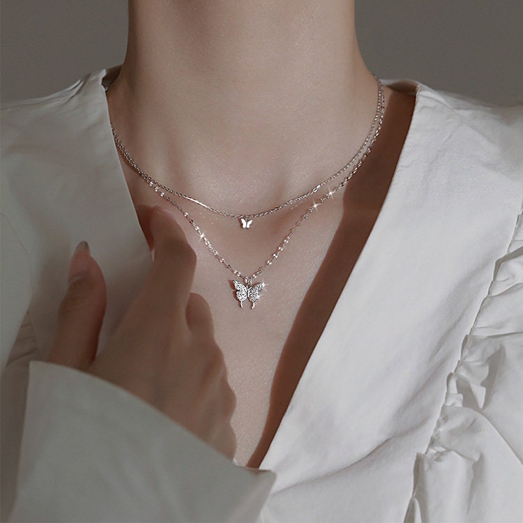 Collier double papillon en argent