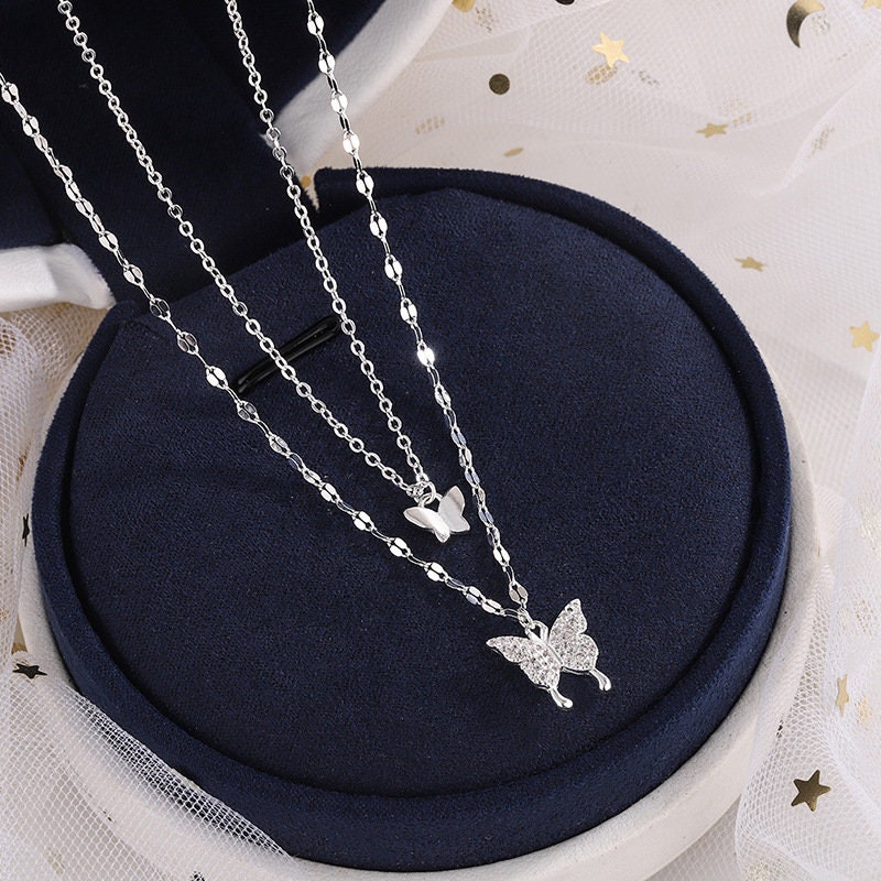 Collier double papillon en argent